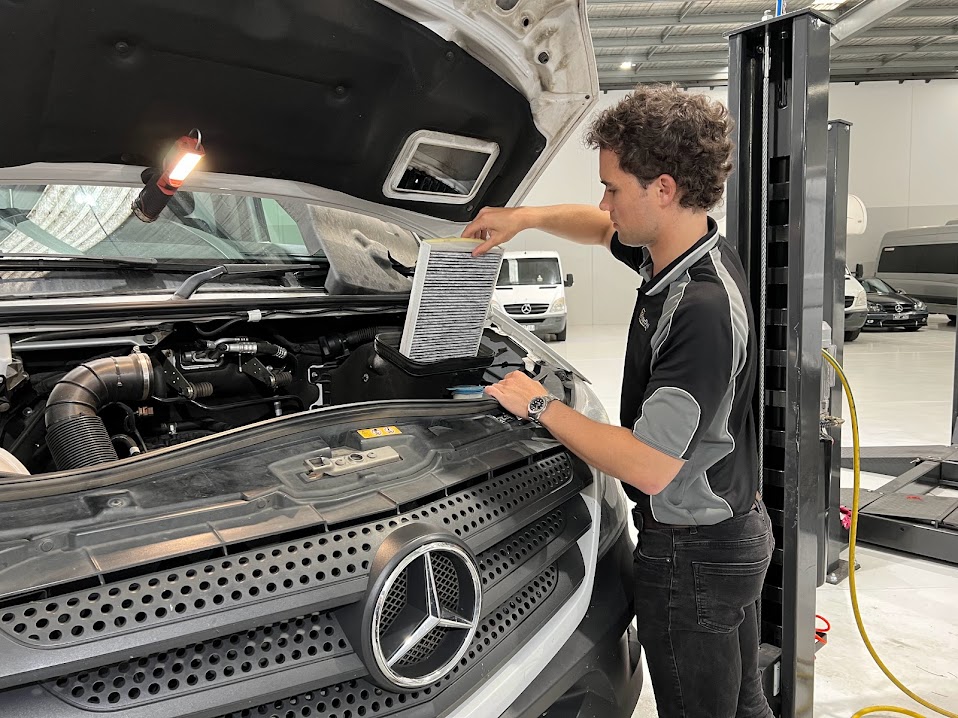 inspecting the engine compartment and filter of a mercedes sprinter
